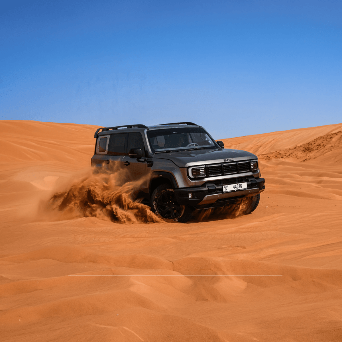 BAIC 4x4 SUV tearing through UAE desert dunes