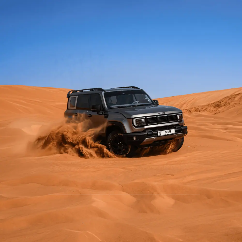 BAIC 4x4 SUV tearing through UAE desert dunes