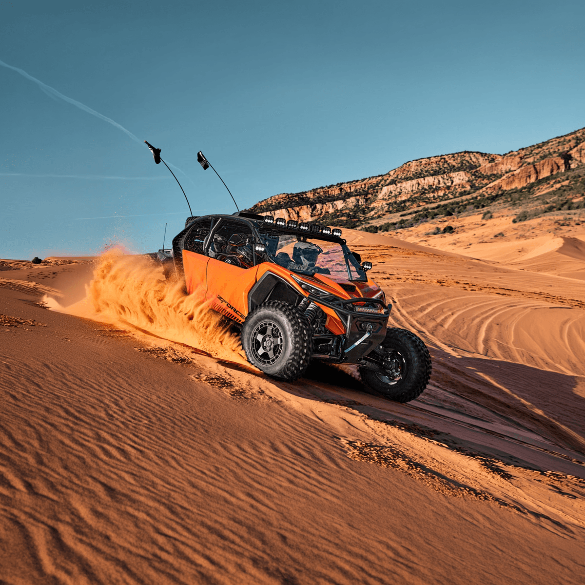 CFMOTO ZForce UTV ripping through desert sand
